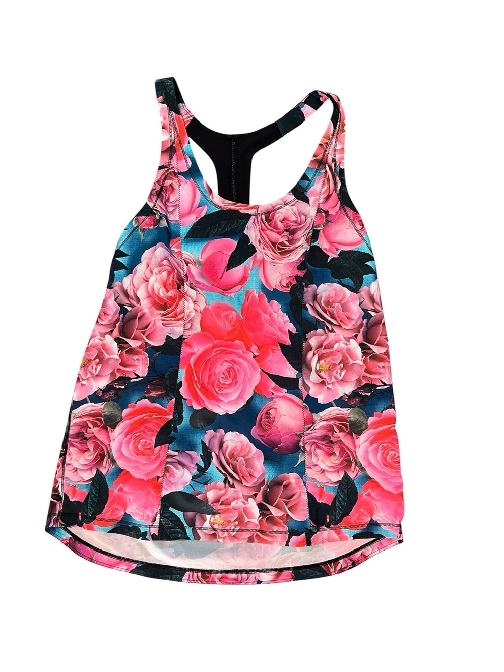 Lululemon pink rose print tank top with black leaves on a dark blue background